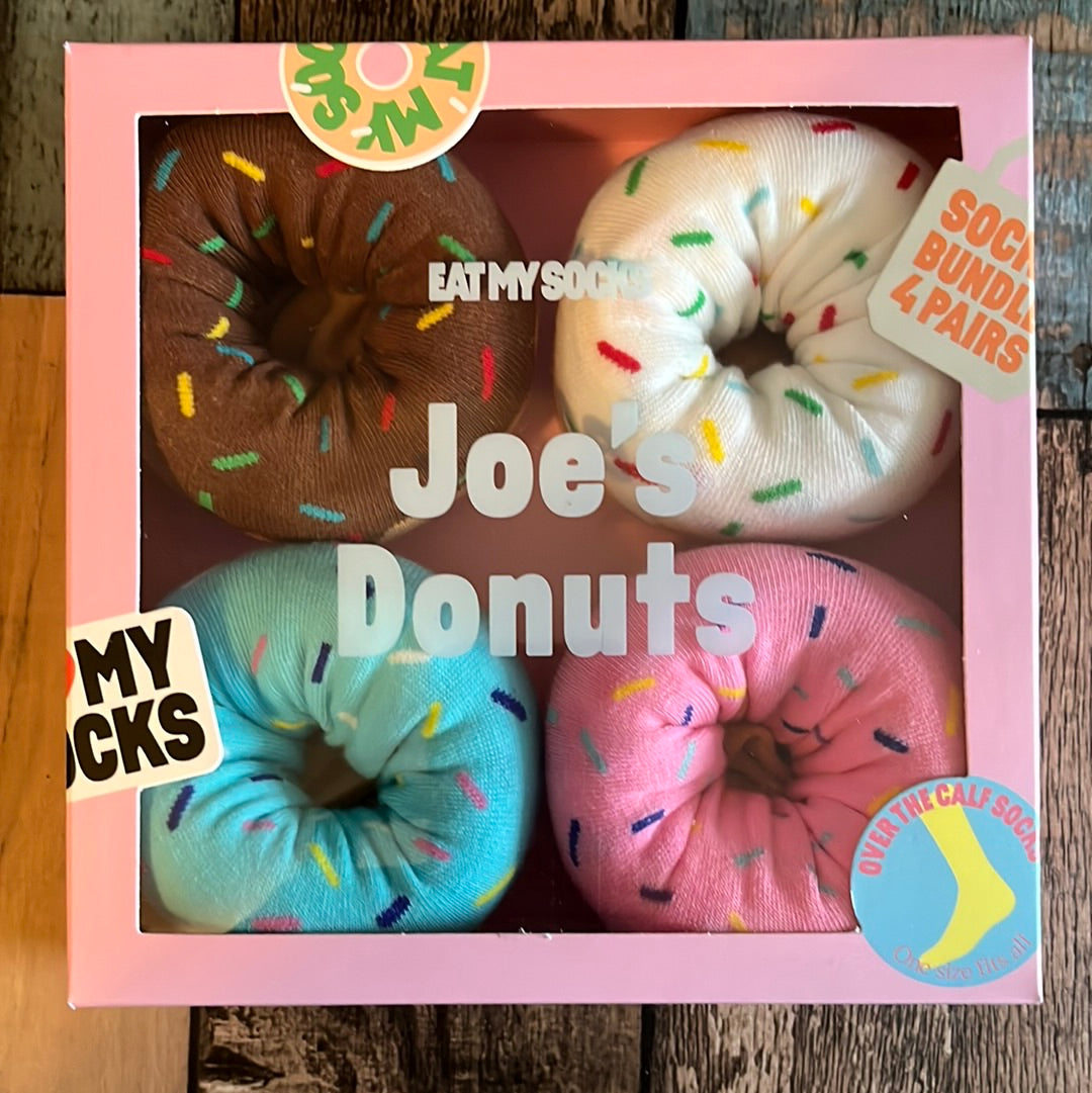 Joe's Donuts Socks. 4 Pair of fun socks in a donut box. Pair #1- Brown (Chocolate Donut) with " Sprinkles' Pair #2: White (Vanilla Donuts) with "Sprinkles. Pair #3- Blue (Blueberry Donuts) with "Sprinkles" Pair #4- Pink (Strawberry Donuts) with "Sprinkles" Brand: Eat My Socks
