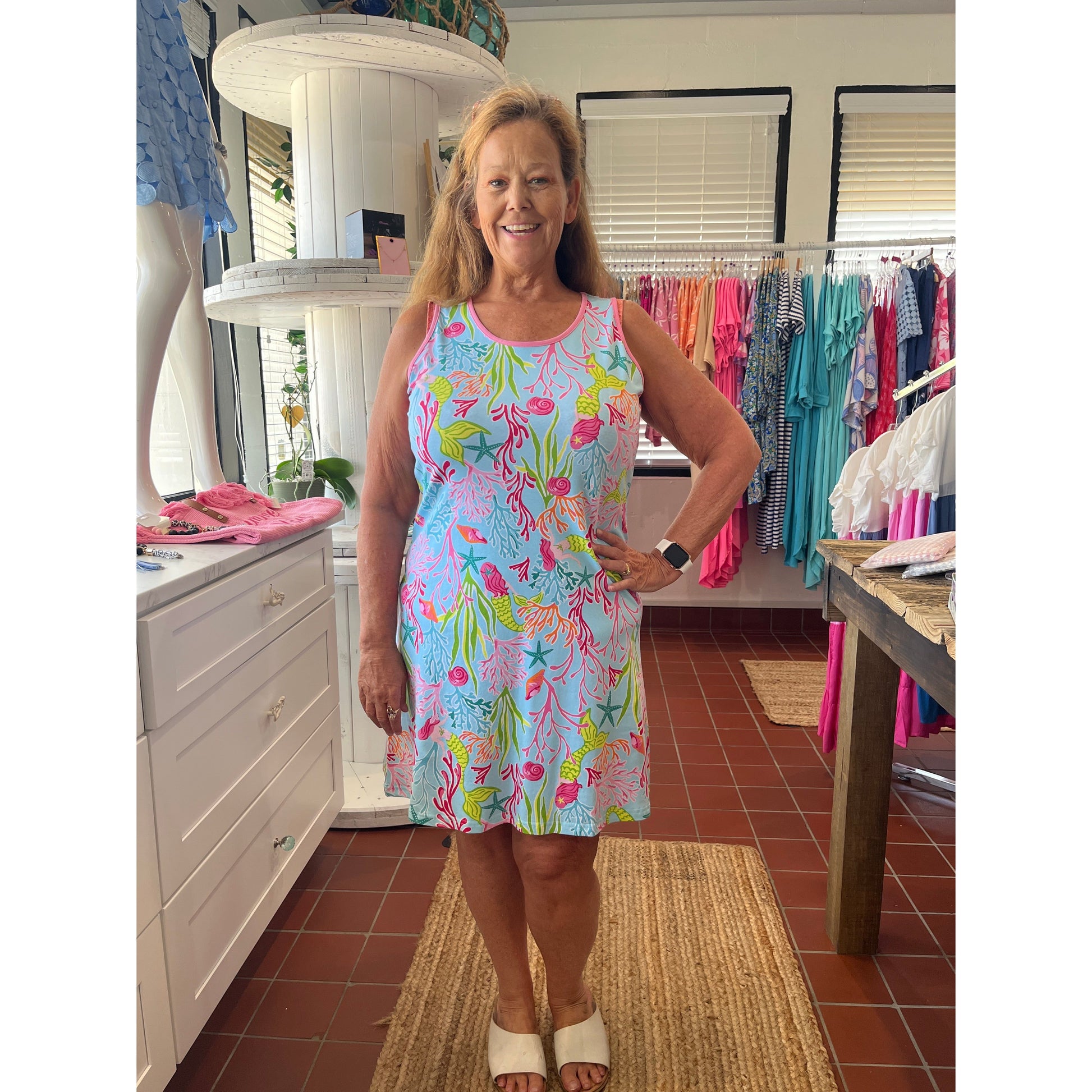 Molly Swing Tank Dress with Mermaid design.  Available in sizes Small through XXL.  95% Cotton, 5% Spandex.  SPF protection