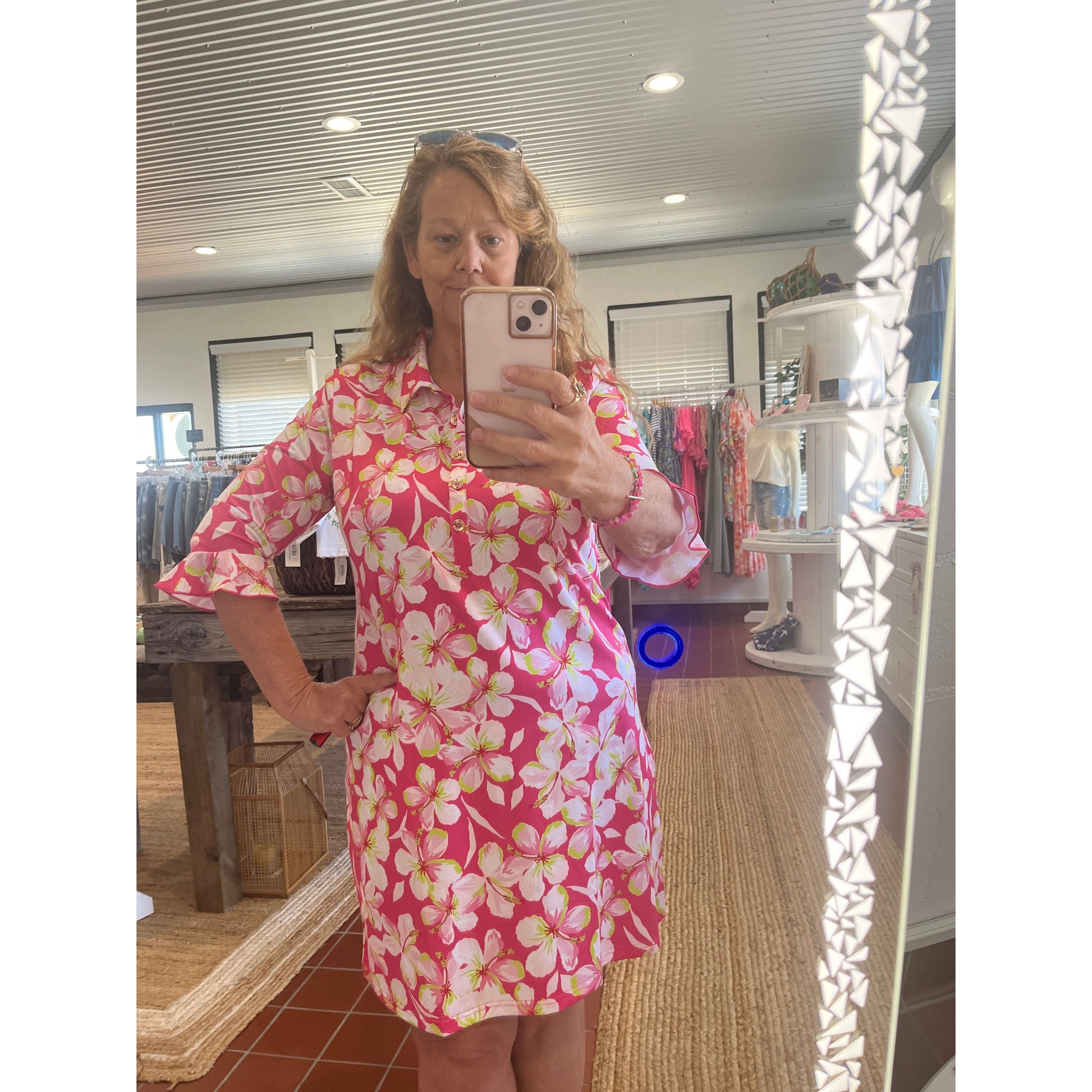 Marin flounce sleeve polo dress available in sizes Medium through XL.  Brand: Ana Clara.  Model is wearing an XL.