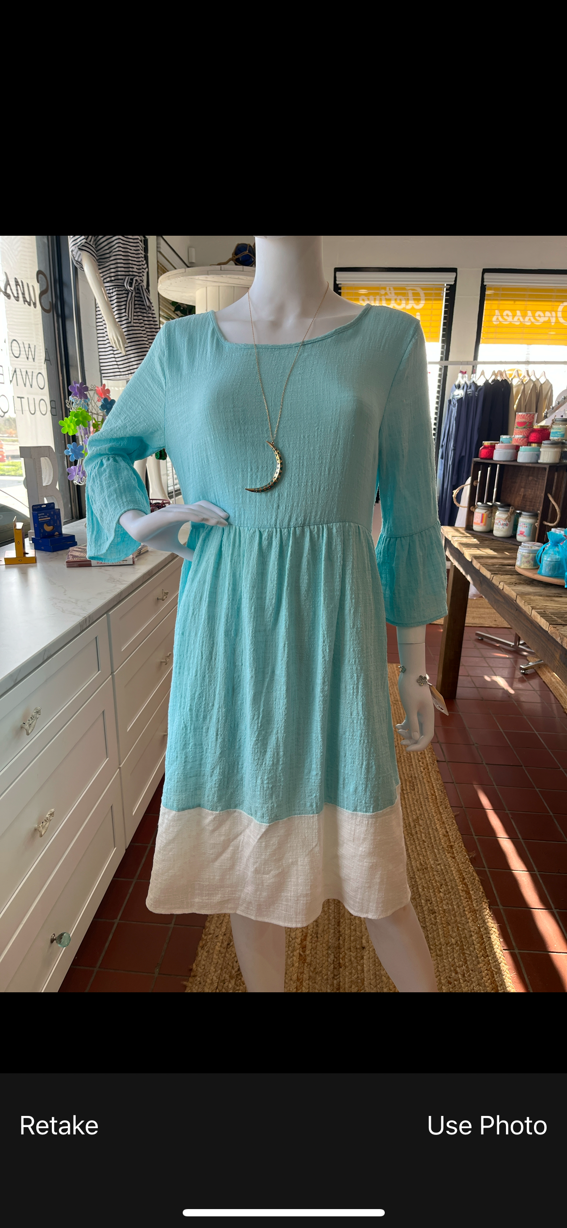 Sky blue 3/4 sleeve dress available in sizes Small through Large. 100% Polyester