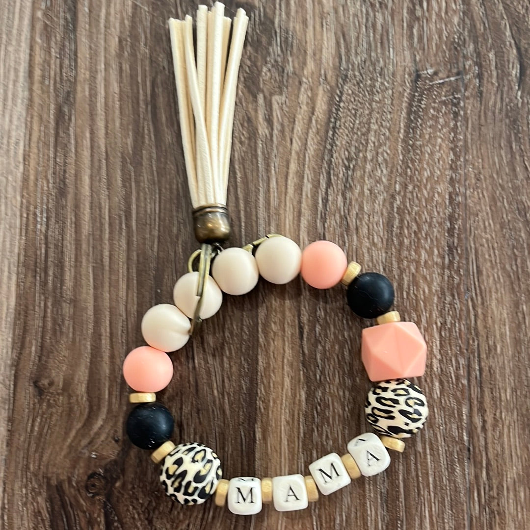 Mama silicone beaded keychain wristlet with peach and black beads and natural color tassels