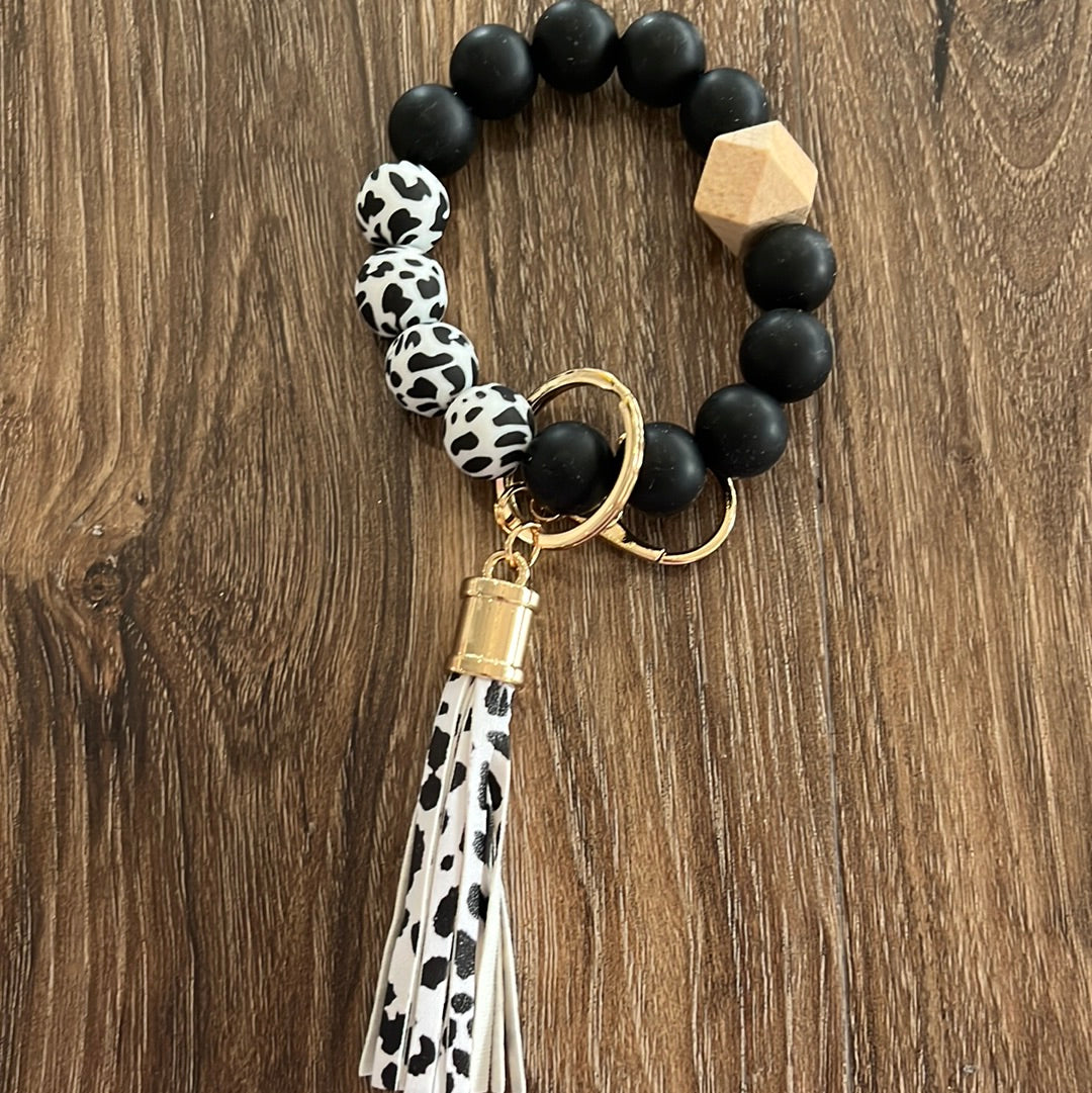 Black and black and white animal print silicone beaded keychain wristlet with tassel