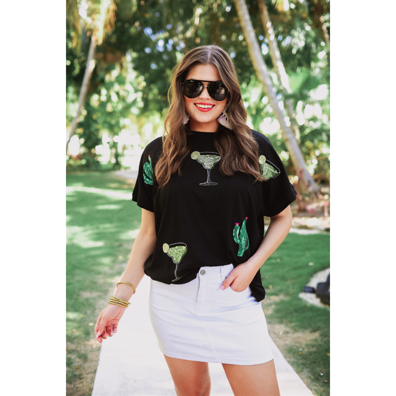 Drinks on Me sequin patch top available in sizes Small through 3X. 60% Polyester, 35% Rayon, 5% Spandex. Brand: Jess Lea