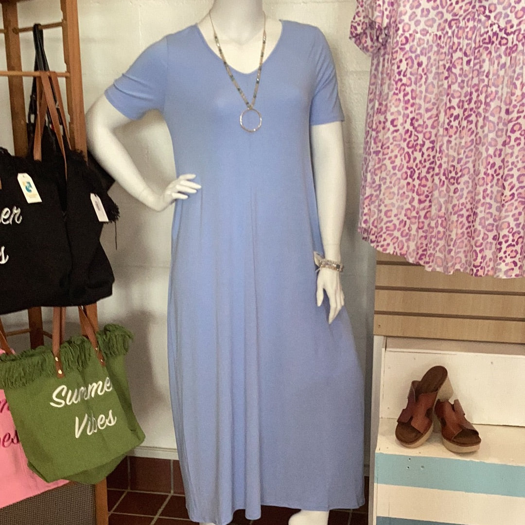 Plus size v-neck maxi dress with pockets available in sizes 1X-3X. 57% Polyester, 38% Rayon, 9% Spandex Zenana. Spring Blue.