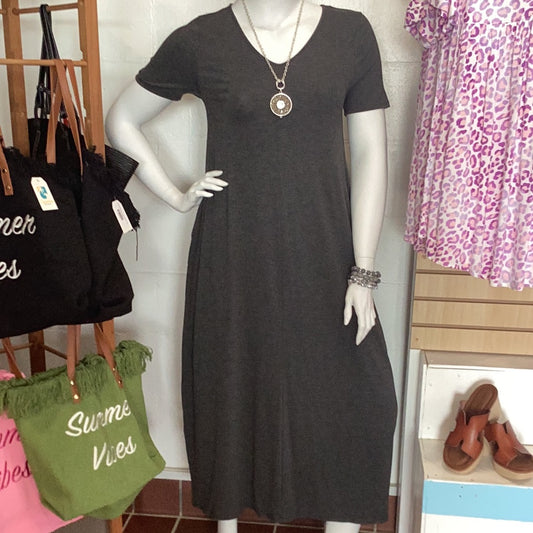 V-Neck Maxi Dress with pockets by Zenana.  Available in Lavender, Spring Blue and Charcoal in sizes Small through XLarge . 57% Polyester, 38% Rayon, 9% Spandex