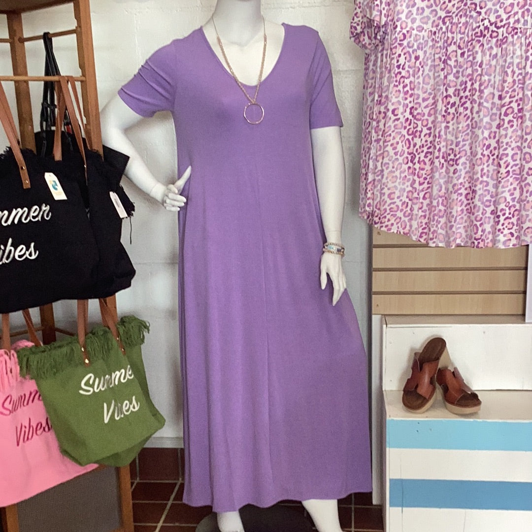 Plus size v-neck maxi dress with pockets available in sizes  1X-3X. 57% Polyester, 38% Rayon, 9% Spandex  Zenana. Lavender