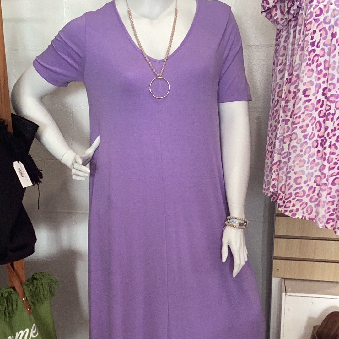 Plus size v-neck maxi dress with pockets available in sizes 1X-3X. 57% Polyester, 38% Rayon, 9% Spandex Zenana. Lavender