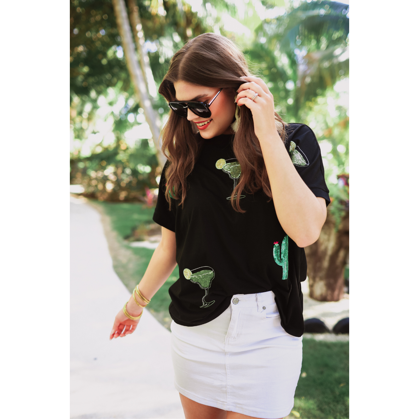 Drinks on Me sequin patch top available in sizes Small through 3X. 60% Polyester, 35% Rayon, 5% Spandex. Brand: Jess Lea